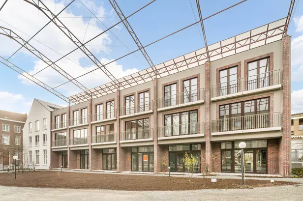 woningen in Tienen - stadswoningen met stadstuin aan een groene zone vooraan