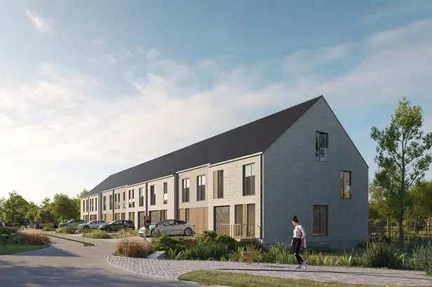 woningen kessel-lo halfopen en gesloten bebouwingen met zadeldak, moderne maar tijdloze architectuur in een lichte gevelsteen, donker dak en houten sierelementen in de gevel