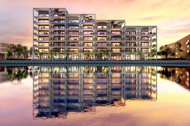 Zicht vanaf het water op de appartementen